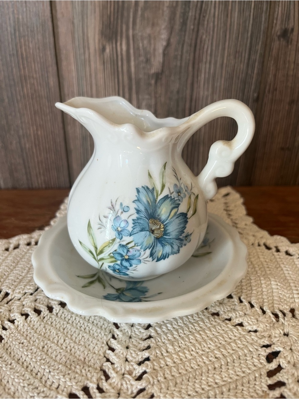 Smaller White Ceramic Pitcher and Saucer with Blue Floral Design